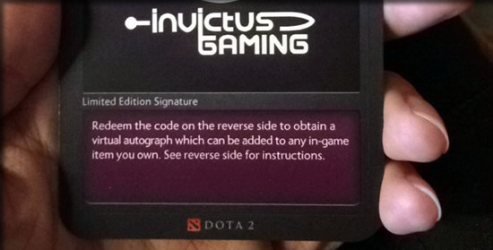 Physical card given out by professional player Card with digital unlock code in hand
